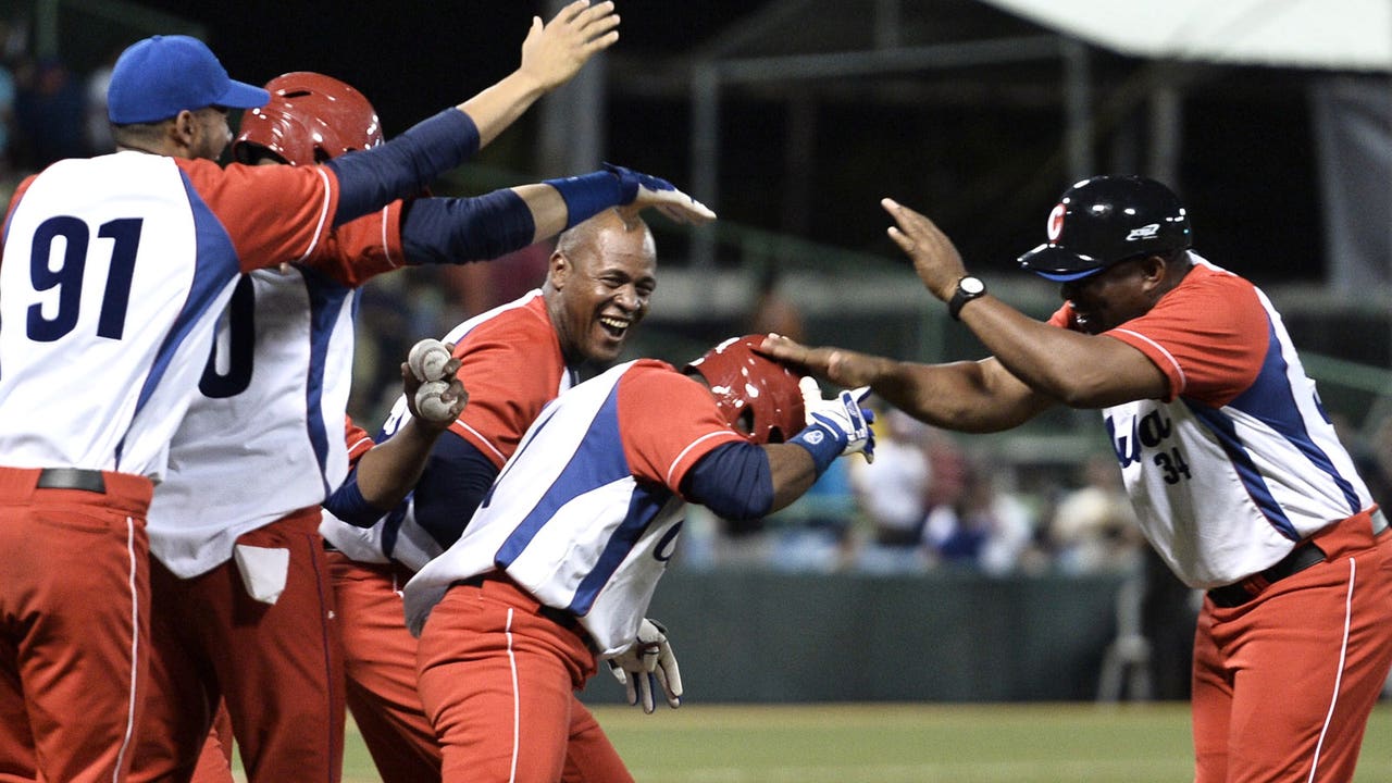 Mendoza-led Cubans defy defections, beat Puerto Rico